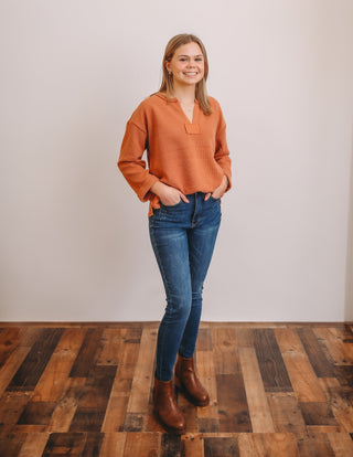 Rough hem knit top