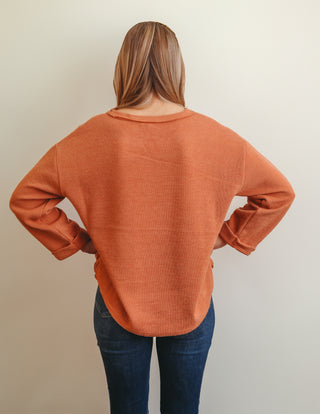 Rough hem knit top