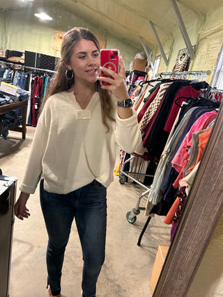 Rough hem knit top