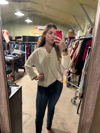 Rough hem knit top
