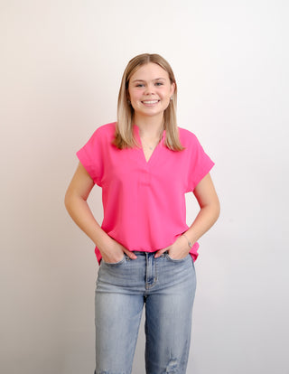 The wear me to work top can be dressed up or down and comes in some great Spring colors. 
No stretch and NOT a loose fit. Size up for loose fit. 
comes in denim blue, fuchsia and sienna