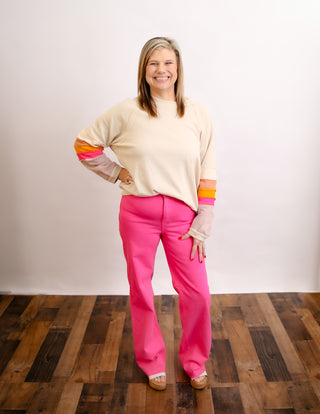 Hot pink Judy Blue straight jeans with heart pocket detail.
