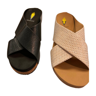 Ablette by Volatile

rustic genuine leather criss cross sandal

available in colors black and champagne snake 

sizes 7-11